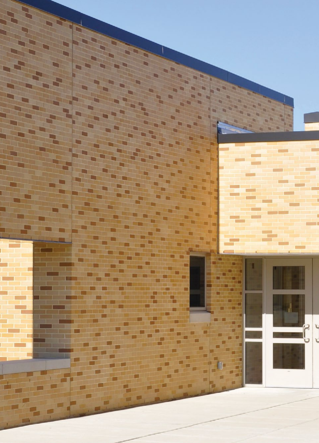 Sto Ceramic applied as a durable, non-combustible exterior finish on an institutional building façade, ideal for EIFS and rainscreen systems in Atlantic Canada's climate