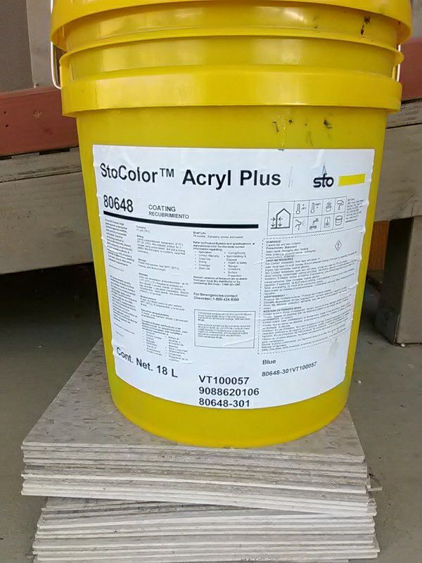 Bucket of StoColor Acryl Plus paint showing product label clearly, ready for exterior wall coating applications