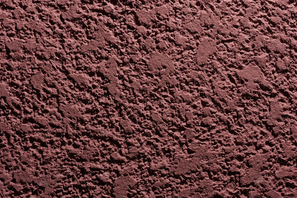 Close-up of rugged Sto stucco texture showcasing coarse acrylic finish ideal for high-performance EIFS and rainscreen façades in commercial and residential applications