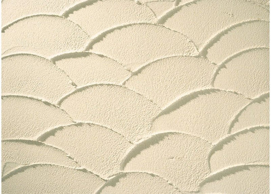 Close up of Stolit Freeform acrylic stucco plaster finish showing unique curved pattern texture