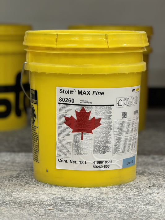 Stolit Max Fine stucco finish used for durable, fine-textured exterior wall coatings. Showing bucket with product label and information