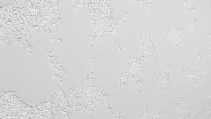 Close up of Stolit Milano White stucco finish showing detailed textured surface and clean white colour